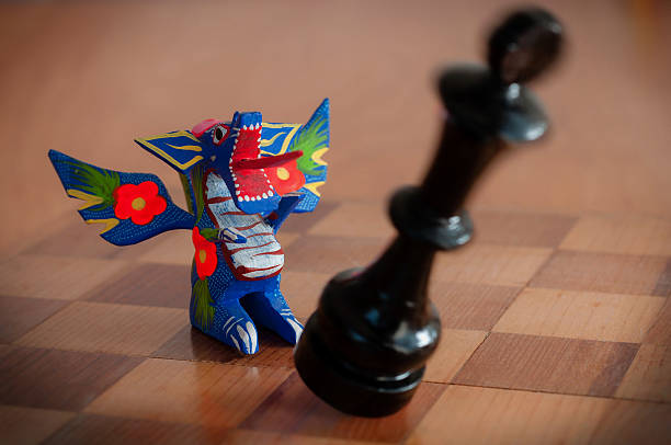 Alebrije vs. chess piece.